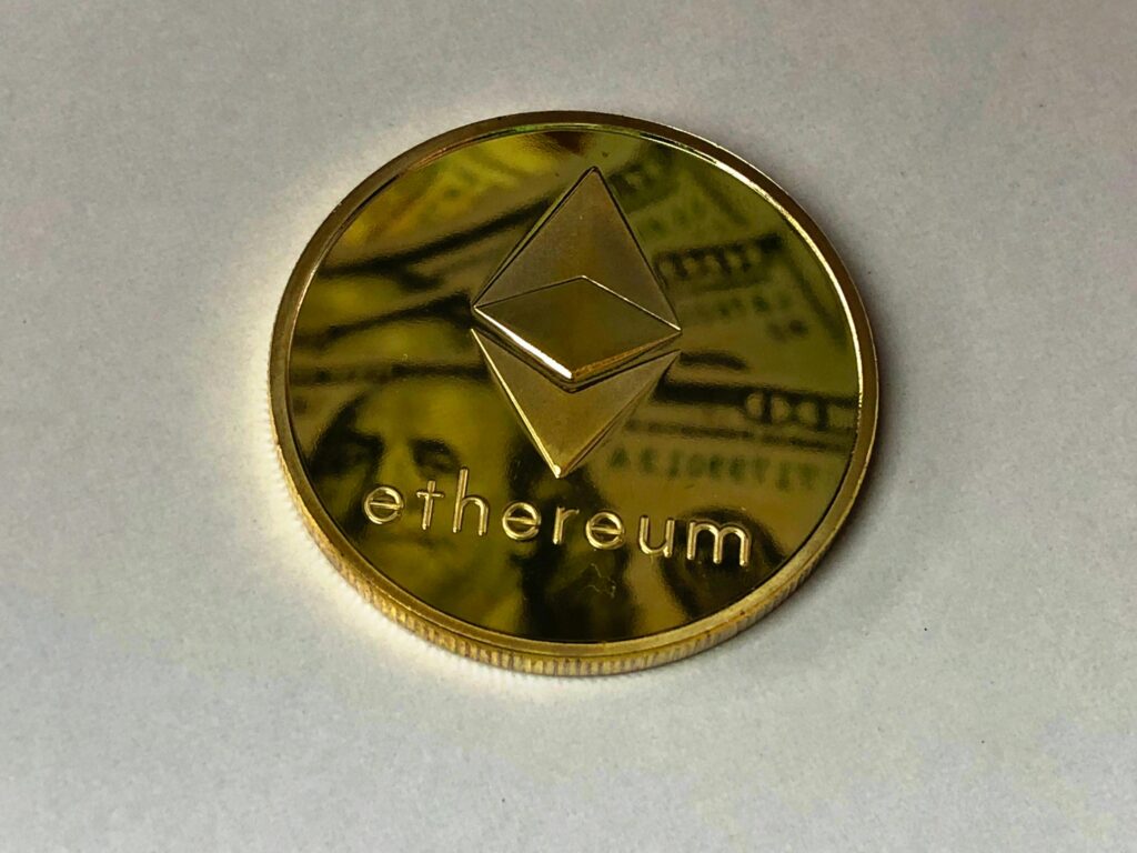 Close-up of a shining Ethereum coin reflecting a dollar bill, symbolizing digital currency and wealth.